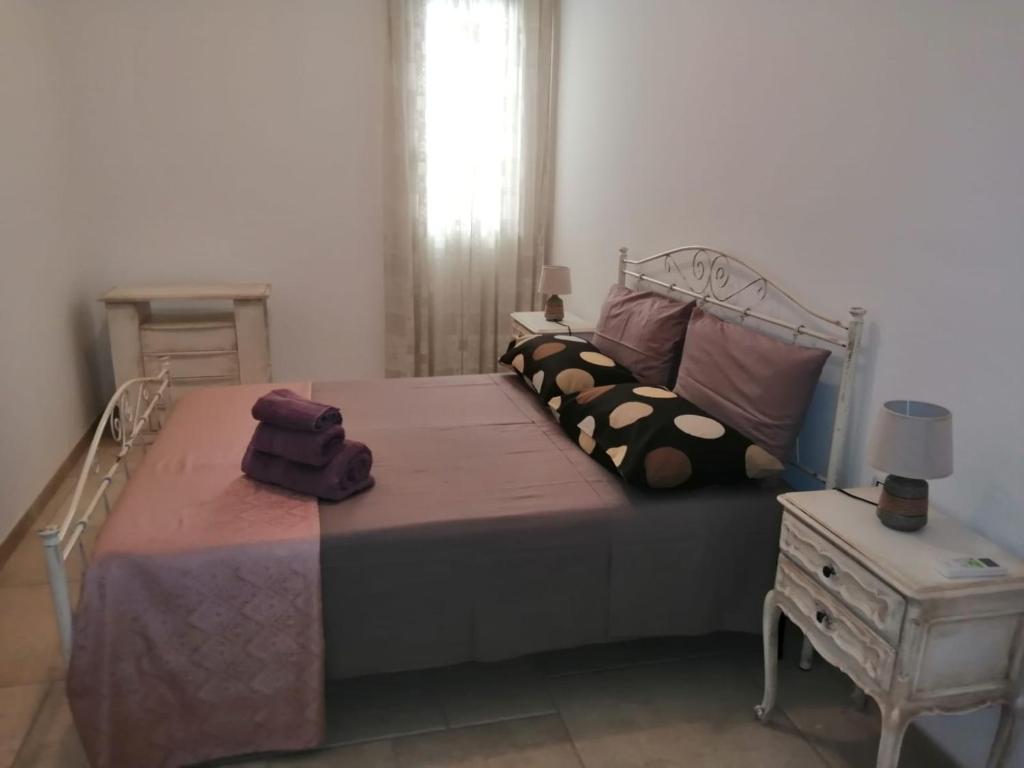 A bed or beds in a room at La Nuova Casetta