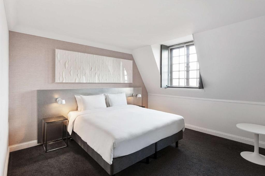 Postel nebo postele na pokoji v ubytování Radisson Blu Hotel, Leeds City Centre