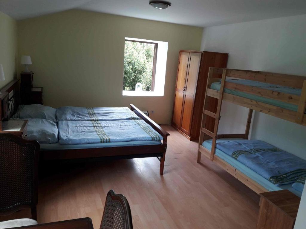 Postel nebo postele na pokoji v ubytování Penzion Zámecká