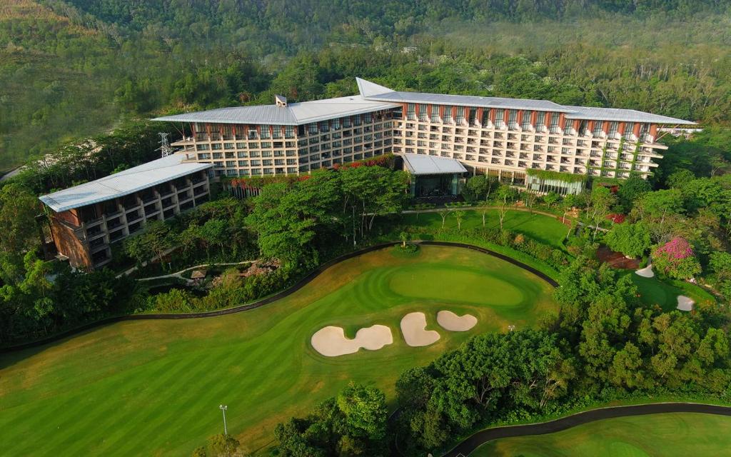 an aerial view of a hotel with a golf green at Shenzhen Castle Hotel in Longgang