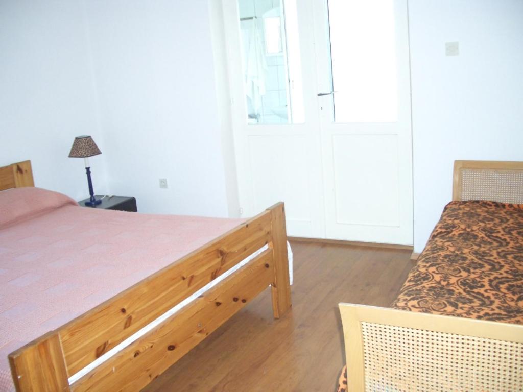 Posteľ alebo postele v izbe v ubytovaní Apartment in Kukljica with sea view, terrace, air conditioning, Wi-Fi (4567-1)