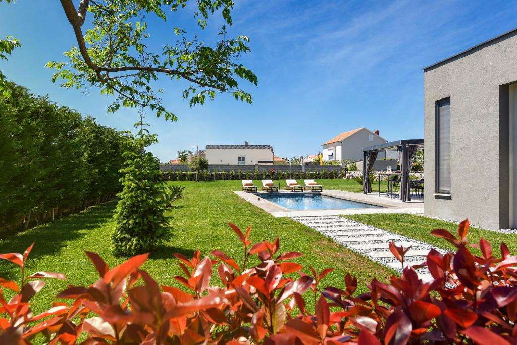 Vonkajšia záhrada v ubytovaní Villa Topaz