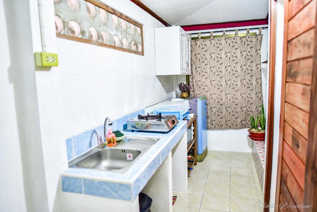 Kuchyň nebo kuchyňský kout v ubytování Serenity1 Homestay