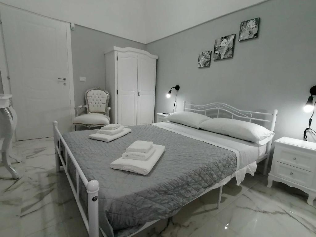 Postel nebo postele na pokoji v ubytování B&B WHITE HOUSE