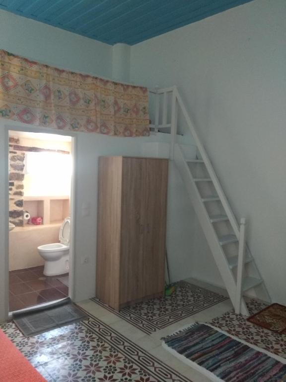 Postel nebo postele na pokoji v ubytování Popi Studios