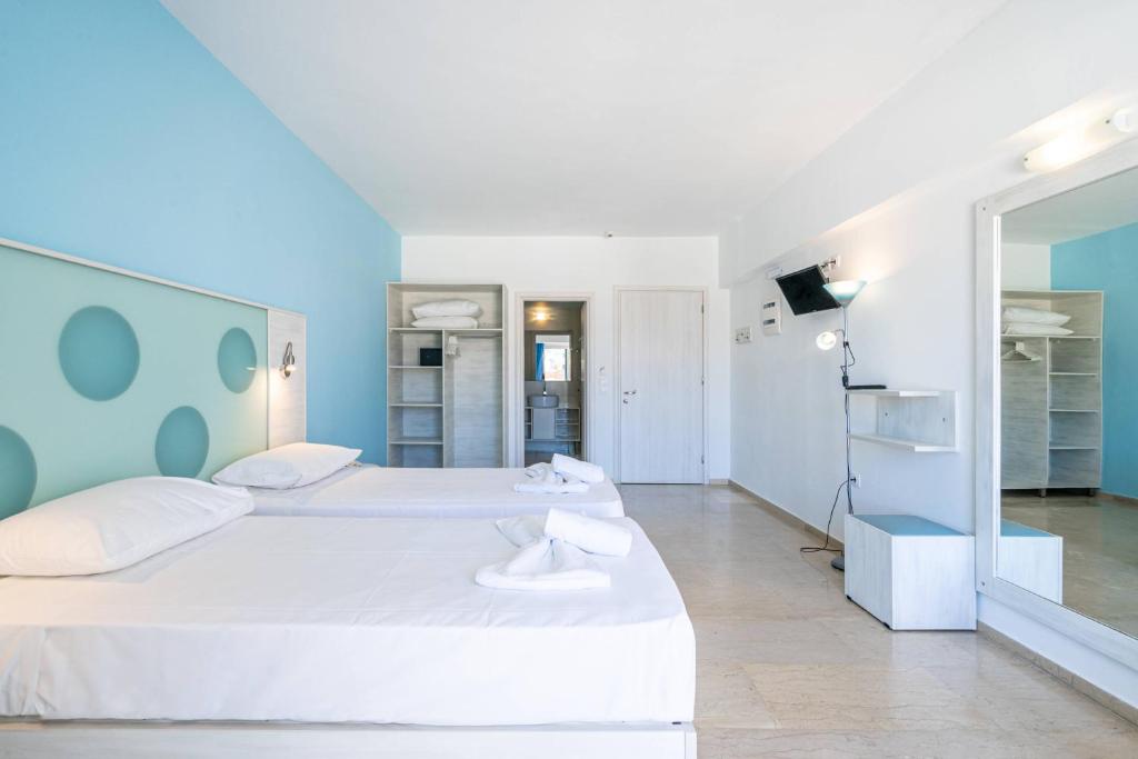 Postel nebo postele na pokoji v ubytování Santa Maria City Hotel