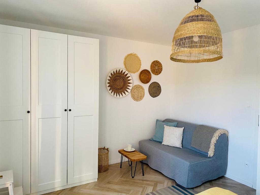 Posedenie v ubytovaní Apartamenty Piaskowe B21 z tarasem na dachu