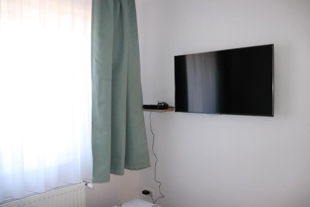 Fotografia z galérie ubytovania Liget Apartmanház v destinácii Kehidakustány
