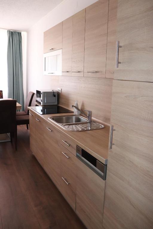 Fotografia z galérie ubytovania Liget Apartmanház v destinácii Kehidakustány