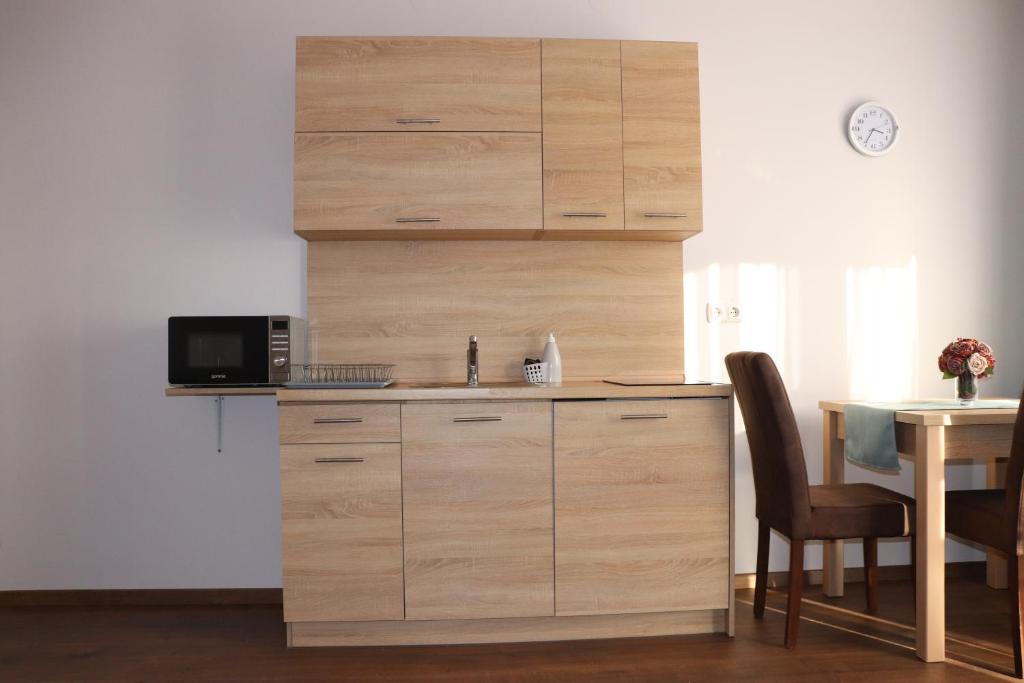 Fotografia z galérie ubytovania Liget Apartmanház v destinácii Kehidakustány