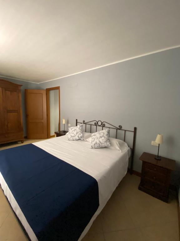 Posteľ alebo postele v izbe v ubytovaní Casa Vacanze La Villetta