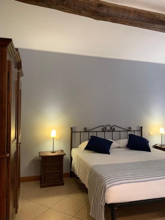 Posteľ alebo postele v izbe v ubytovaní Casa Vacanze La Villetta