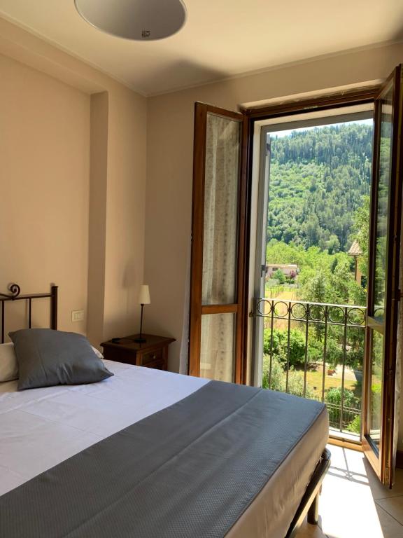 Posteľ alebo postele v izbe v ubytovaní Casa Vacanze La Villetta