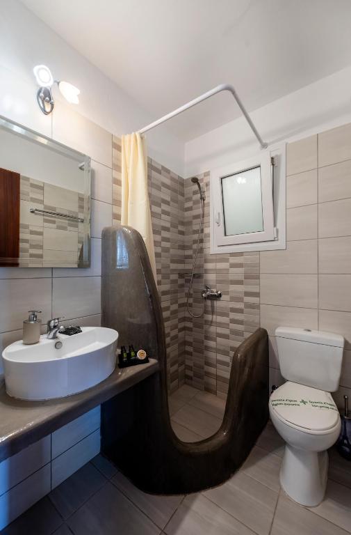 Koupelna v ubytování Stella Hotel