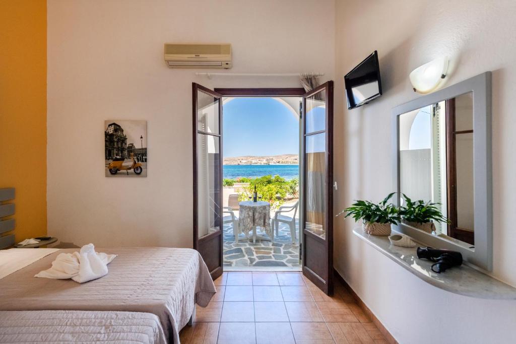 Postel nebo postele na pokoji v ubytování Stella Hotel