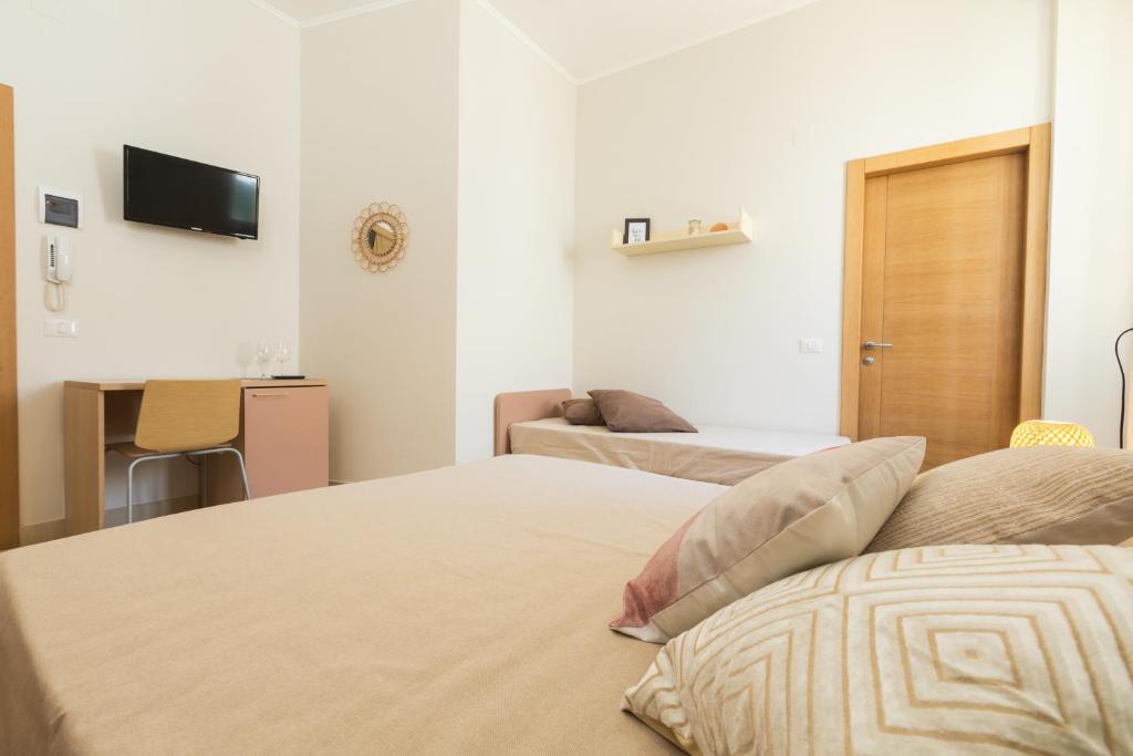 Postel nebo postele na pokoji v ubytování Viesthouse B&B
