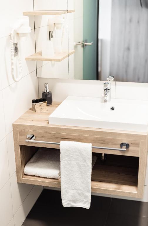 Kúpeľňa v ubytovaní Hotel Smart Liv'in