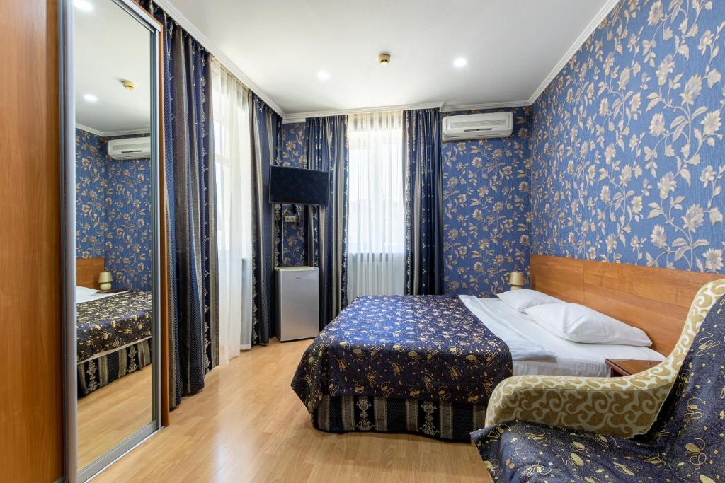 Cama o camas de una habitación en Arkadia Guest House