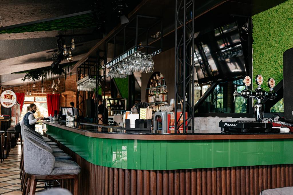 Lounge nebo bar v ubytování Alice Place Hotel