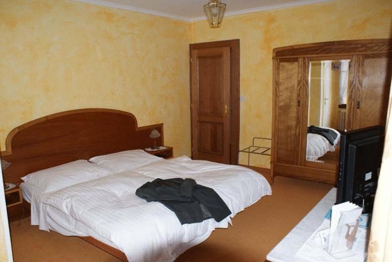 Postel nebo postele na pokoji v ubytování Hotel de Bahyse
