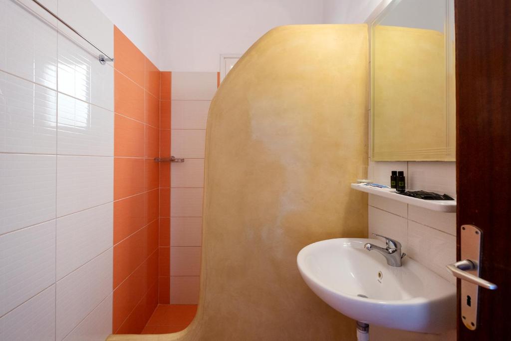 Koupelna v ubytování Stella Hotel