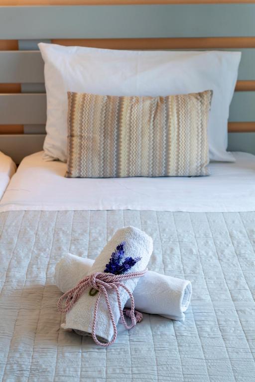 Postel nebo postele na pokoji v ubytování Stella Hotel