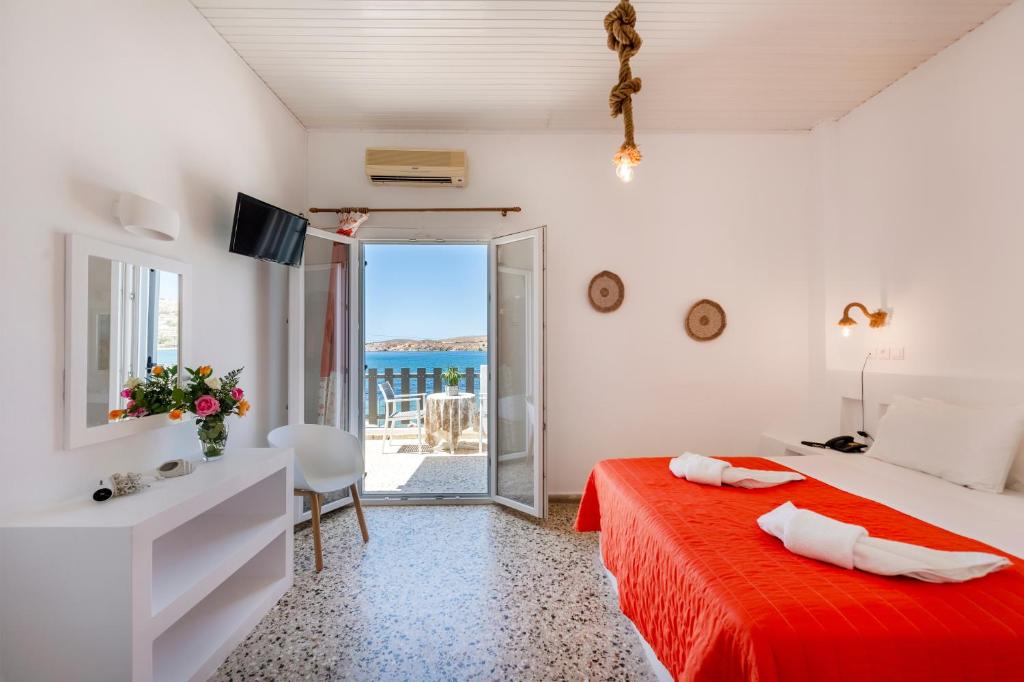 Postel nebo postele na pokoji v ubytování Stella Hotel
