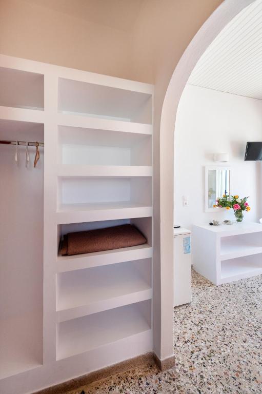 Postel nebo postele na pokoji v ubytování Stella Hotel
