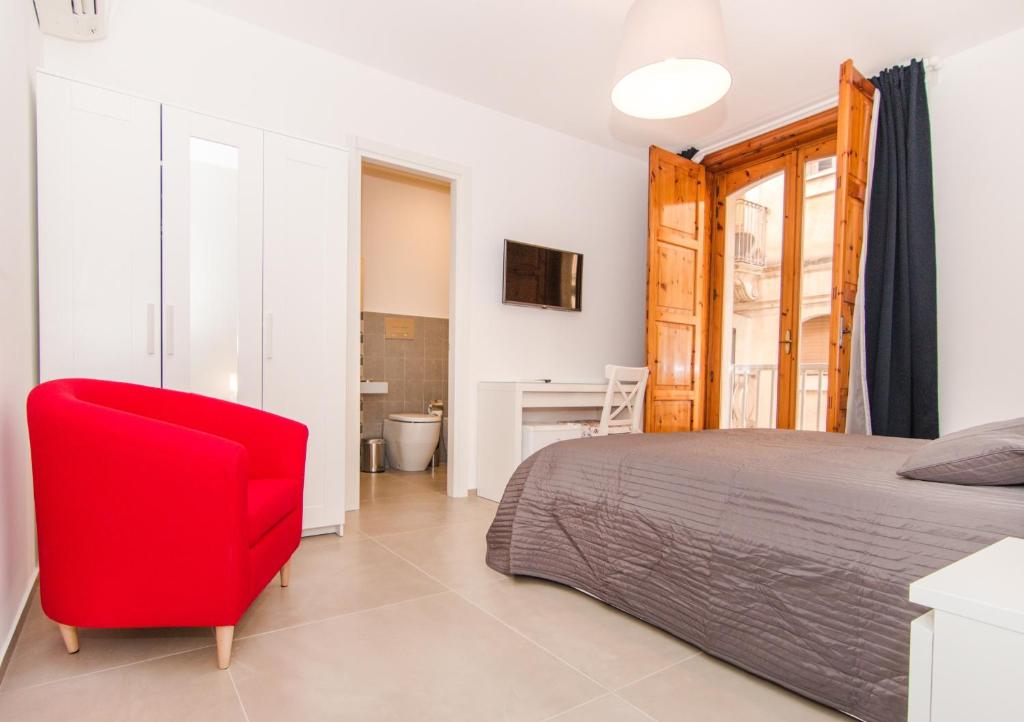 Postel nebo postele na pokoji v ubytování Casa Di Hilde