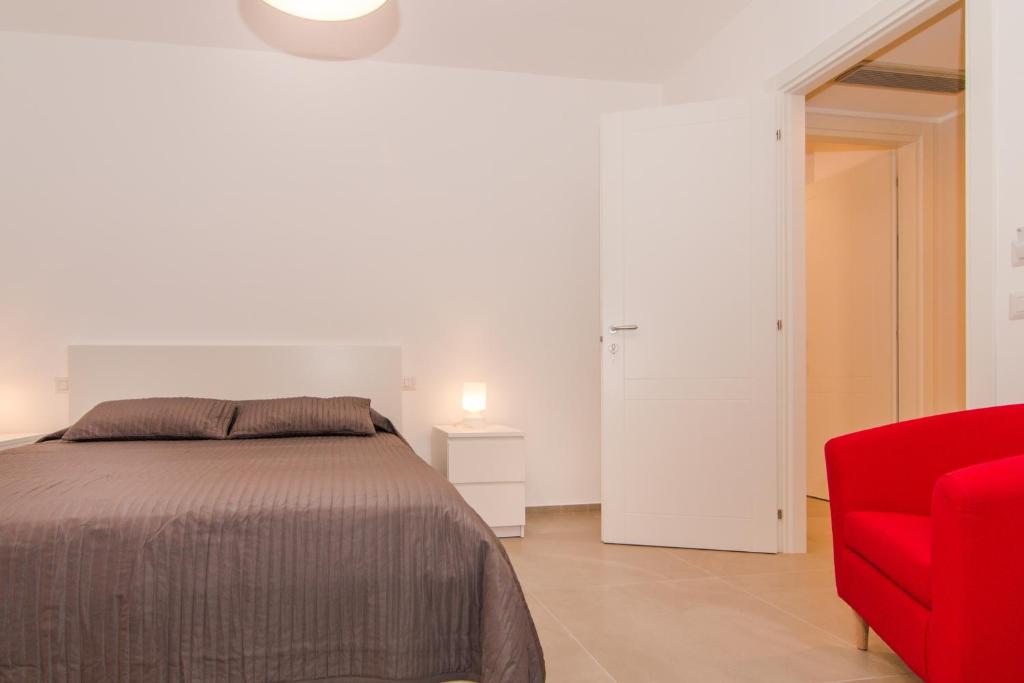 Postel nebo postele na pokoji v ubytování Casa Di Hilde