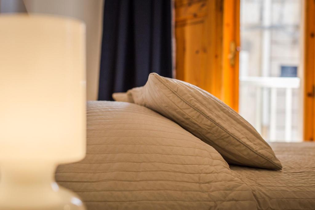 Postel nebo postele na pokoji v ubytování Casa Di Hilde