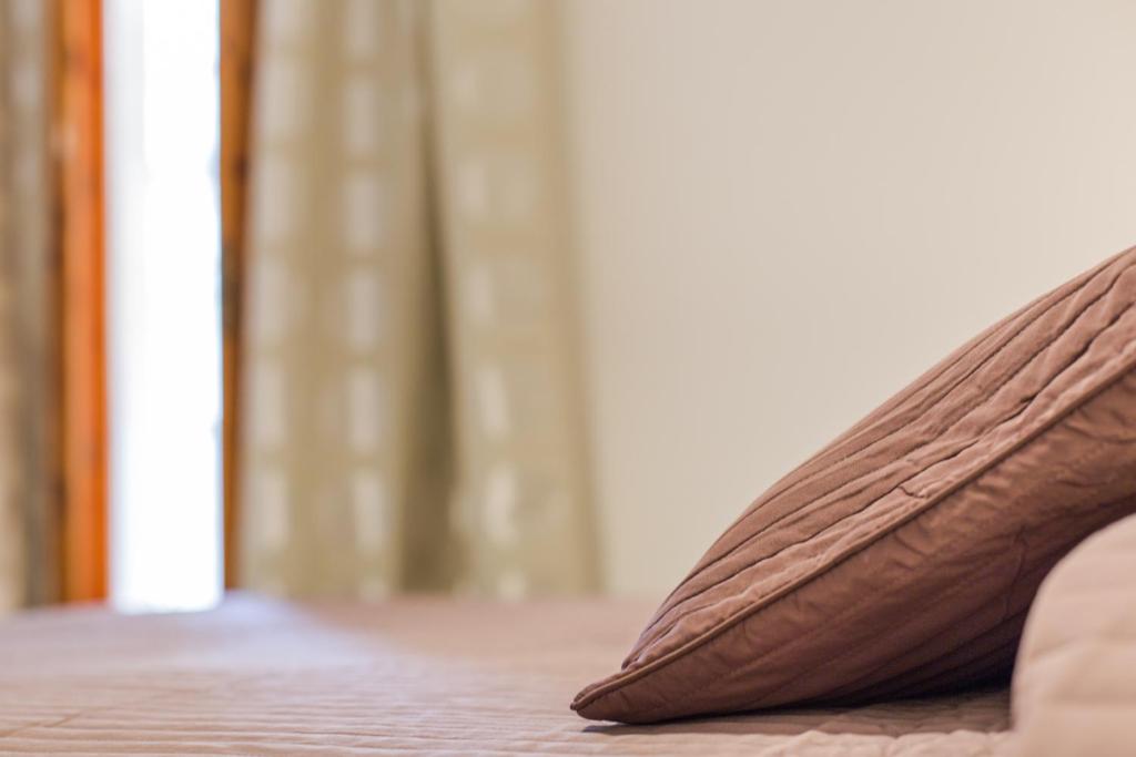Postel nebo postele na pokoji v ubytování Casa Di Hilde