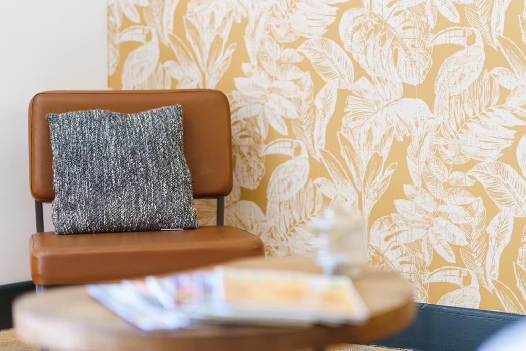 Posezení v ubytování Logement Onze Chambres & Gîtes