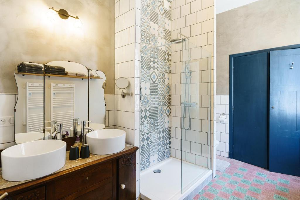 Koupelna v ubytování Logement Onze Chambres & Gîtes