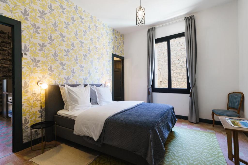 Postel nebo postele na pokoji v ubytování Logement Onze Chambres & Gîtes