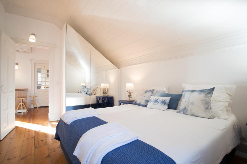 Postel nebo postele na pokoji v ubytování Casa de Santa Teresa