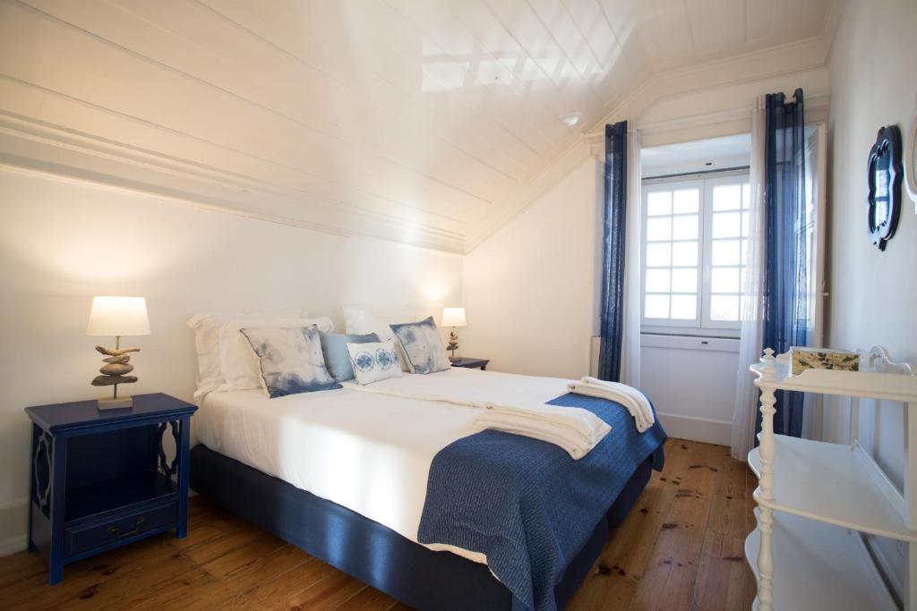 Postel nebo postele na pokoji v ubytování Casa de Santa Teresa