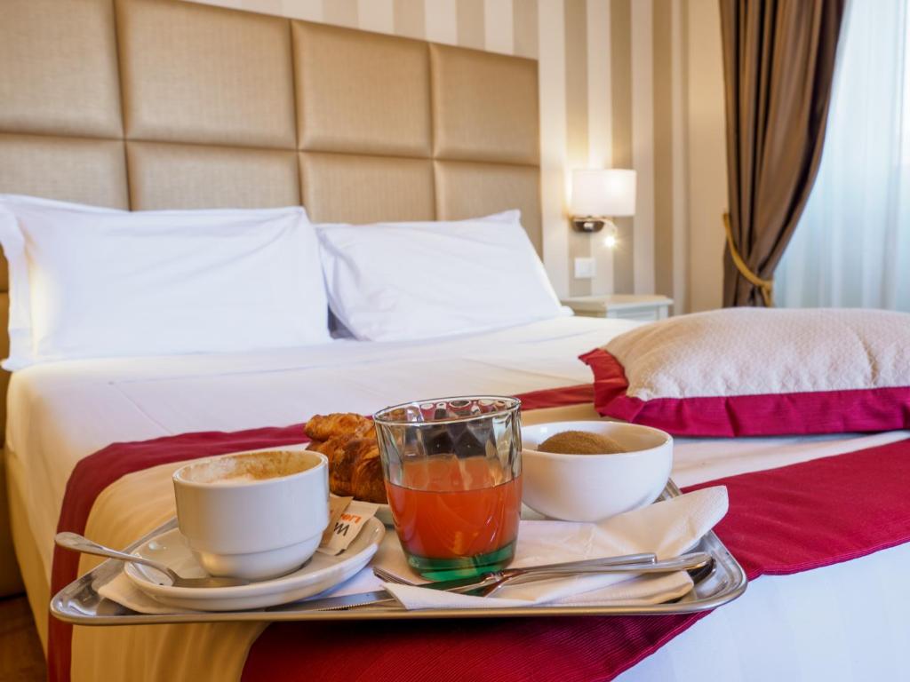 Posteľ alebo postele v izbe v ubytovaní Dei Priori Boutique Hotel