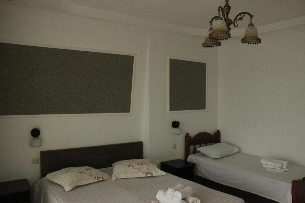 Postel nebo postele na pokoji v ubytování Badu Guest House