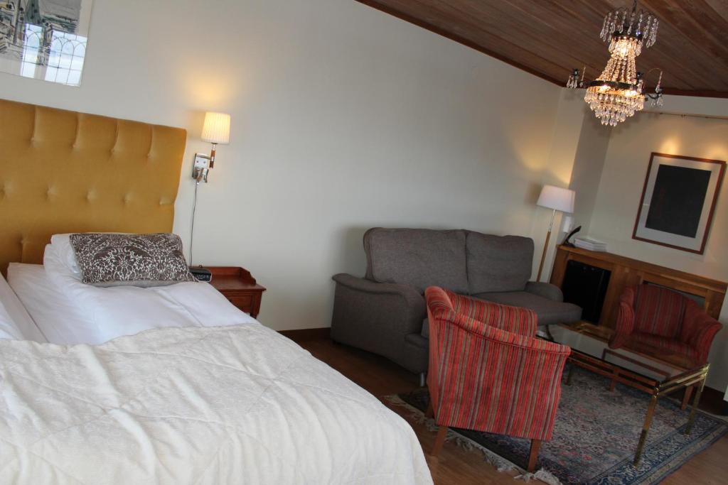 Postel nebo postele na pokoji v ubytování Green Hotel