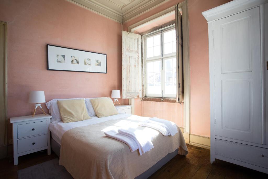 Postel nebo postele na pokoji v ubytování Casa de Santa Teresa