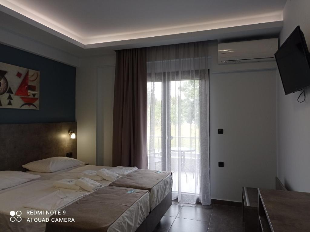 Postel nebo postele na pokoji v ubytování MAK Apartments