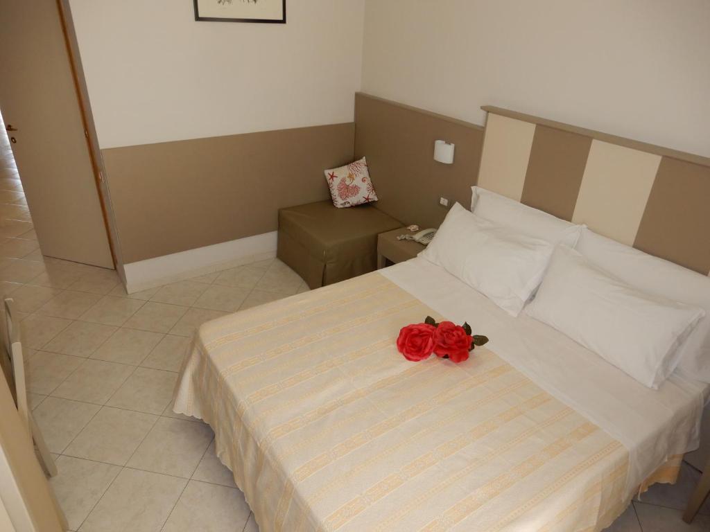 Postel nebo postele na pokoji v ubytování Hotel San Giorgio