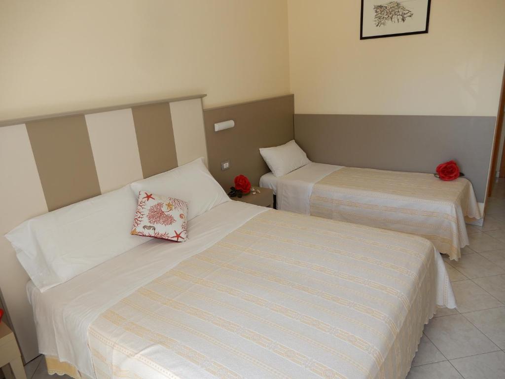 Postel nebo postele na pokoji v ubytování Hotel San Giorgio