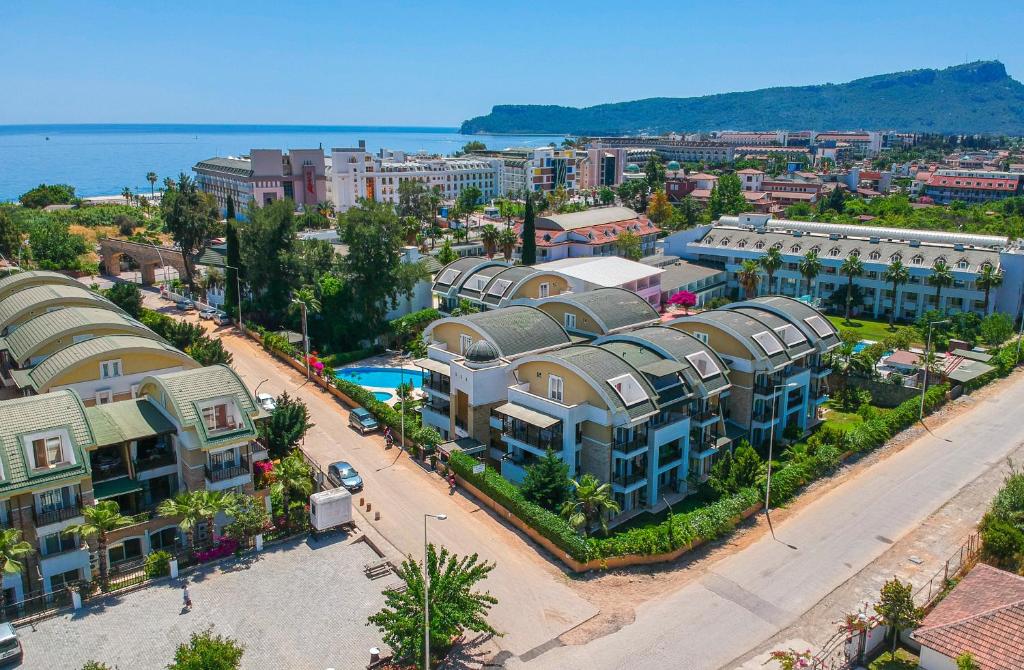 an aerial view of a city with houses and a street at Sultan Homes Apartments 2 in Kemer