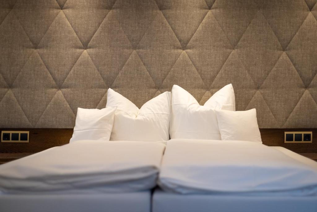 Postel nebo postele na pokoji v ubytování Strass - Sport & Spa Hotel
