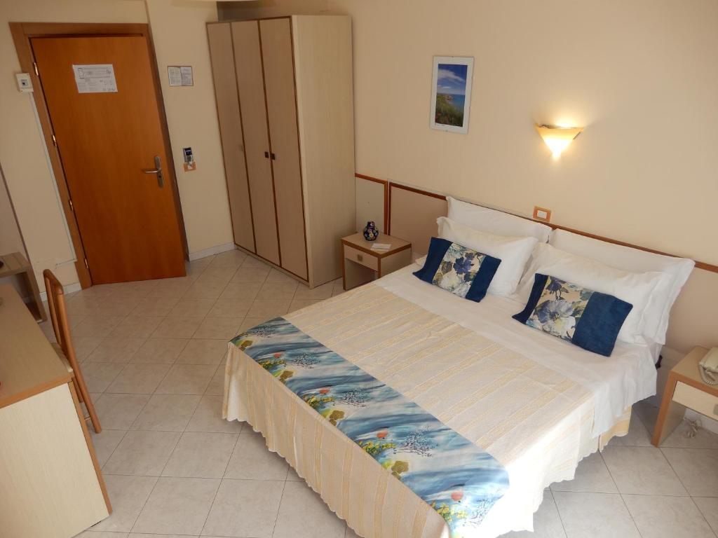 Postel nebo postele na pokoji v ubytování Hotel San Giorgio