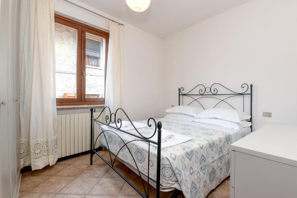 Postel nebo postele na pokoji v ubytování Appartamento Alle Fontane
