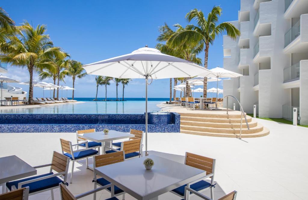 an image of the pool at the excellence paradiso resort at The Morgan Resort Spa & Village in Simpson Bay