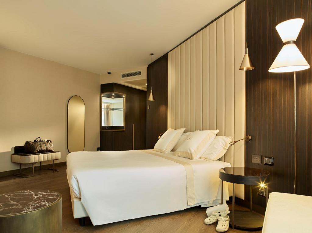 Postel nebo postele na pokoji v ubytování Hotel Niccolo' V - Terme dei Papi